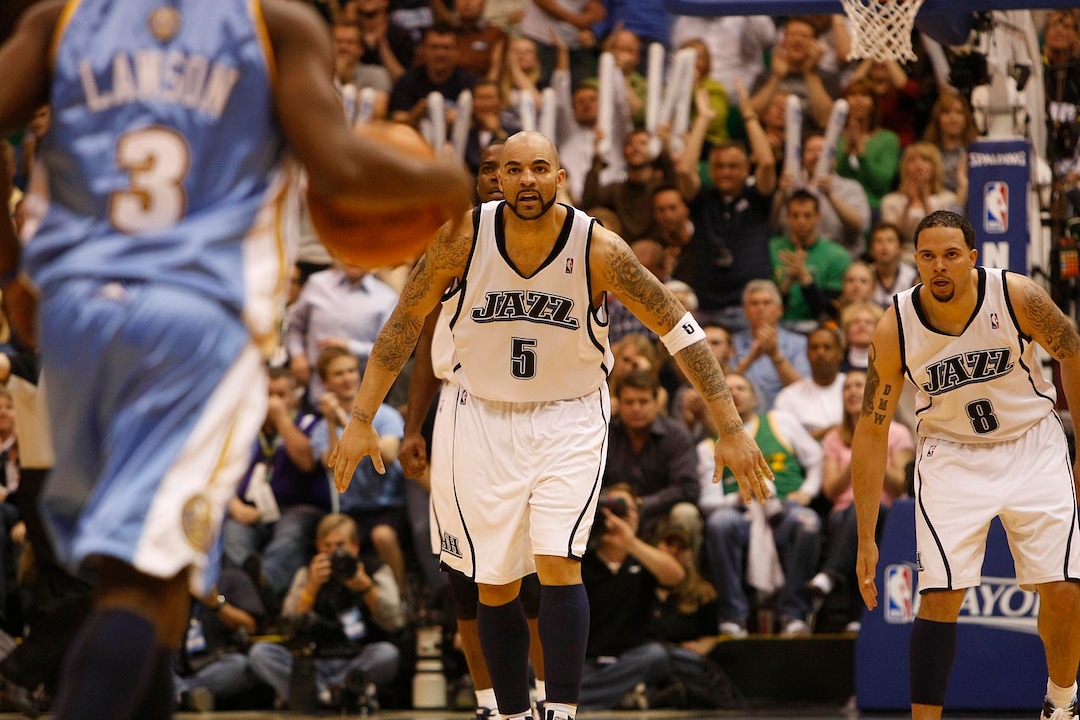 (Jeremy Harmon  |  Tribune file photo) Utah Jazz's Carlos Boozer (5) and Utah Jazz's Deron Williams (8) keep an eye on Denver Nuggets' Ty Lawson (3) in the second half as the Jazz face the Nuggets during in the third game of the first round playoff series at EnergySolutions Arena in 2010.