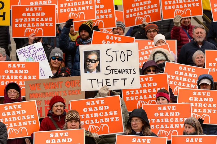 (Trent Nelson | The Salt Lake Tribune) Citizens with signs at a rally on the steps of the State Capitol Building in Salt Lake City against Rep. Chris Stewart's Grand Staircase bill that would create an Escalante National Park. Tuesday December 12, 2017.