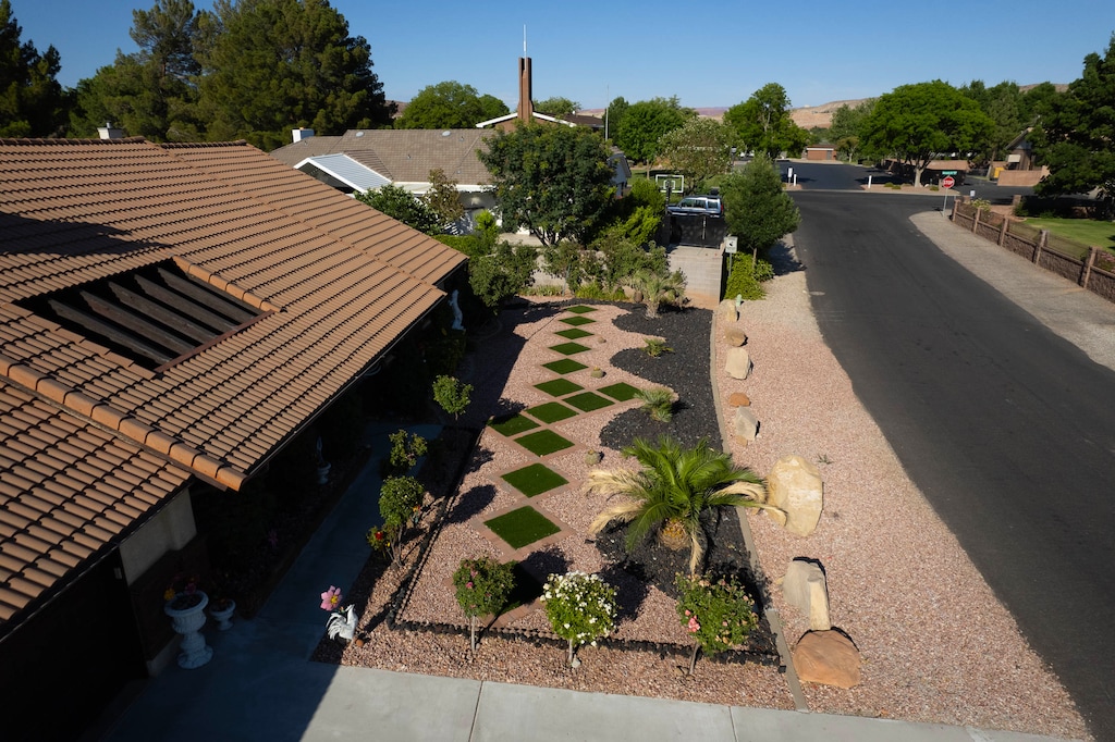 (Francisco Kjolseth  |  The Salt Lake Tribune) Retiree Ofelia Cortez, one of many St. George residents who has taken advantage of the Water Efficient Landscape Rebate was pleased with her results, pictured on Tuesday, June 11, 2024. She enjoys the savings from using less water and not having to pay a gardener to look after her lawn. 