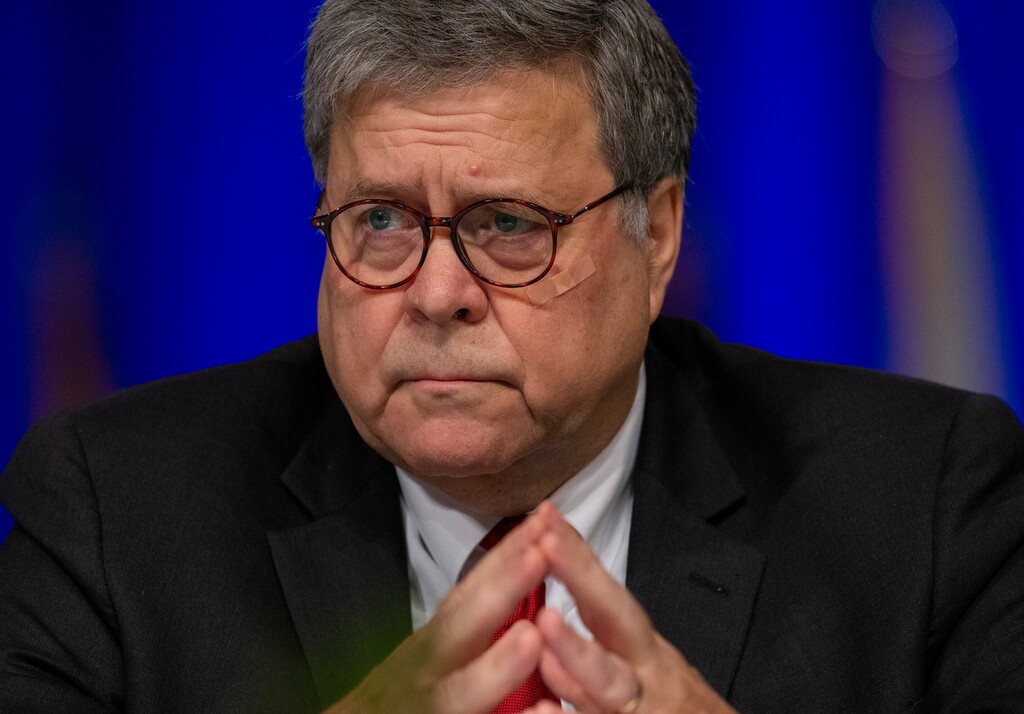 United States Attorney General William Barr, listens to LaToya Cantrell, New Orleans mayor, during the Grand Lodge Fraternal Order of Police's 64th National Biennial Conference at the Ernest N. Morial Convention Center on Convention Blvd. in New Orleans, La. Monday, Aug. 12, 2019. Barr said Monday that there were “serious irregularities” at the federal jail where Jeffrey Epstein took his own life this weekend as he awaited trial on charges he sexually abused underage girls. (David Grunfeld/The Advocate via AP)