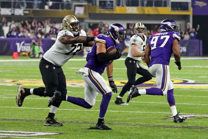 Minnesota Vikings outside linebacker Anthony Barr (55) is hit by New Orleans Saints offensive tackle Terron Armstead (72) after making an interception during the first half of an NFL divisional football playoff game in Minneapolis, Sunday, Jan. 14, 2018. (AP Photo/Jim Mone)