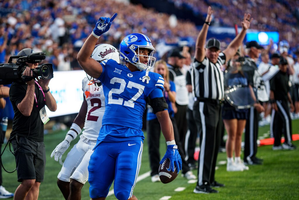 (Trent Nelson | The Salt Lake Tribune) Brigham Young Cougars running back LJ Martin (27) celebrates a touchdown as BYU hosts Southern Illinois, NCAA football in Provo on Saturday, Aug. 31, 2024.