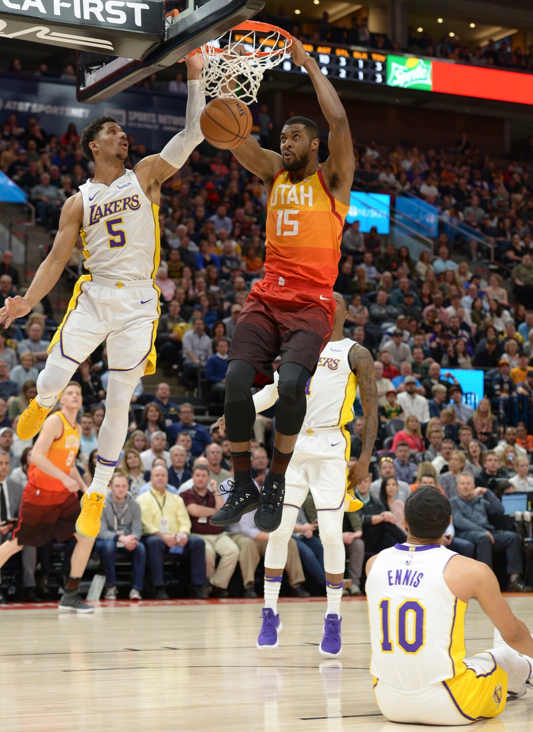 (Leah Hogsten  |  The Salt Lake Tribune)  Utah Jazz forward Derrick Favors (15) dunks on Los Angeles Lakers guard Josh Hart (5) as the Utah Jazz host the Los Angeles Lakers at Vivint Smart Home Arena Tuesday, April 3, 2018