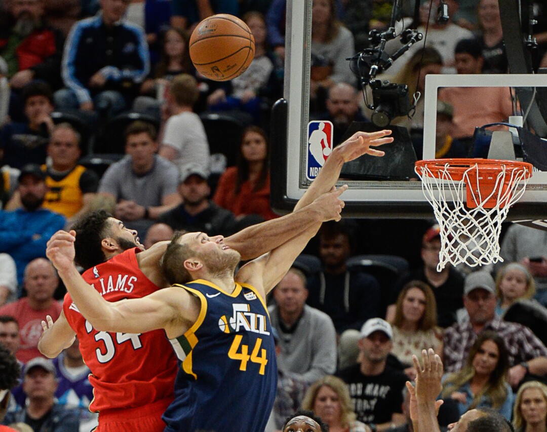 (Francisco Kjolseth  |  The Salt Lake Tribune)  New Orleans Pelicans guard Kenrich Williams (34) blocks Utah Jazz forward Bojan Bogdanovic (44) as the Utah Jazz host the New Orleans Pelicans in their NBA basketball game at Vivint Smart Home Arena in Salt Lake City on Sat. Nov. 23, 2019.