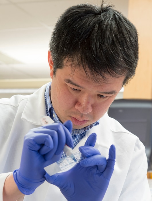 Rick Egan  |  The Salt Lake TribuneWei-Chao Huang works in Gregg's lab at the University of Utah. The team has   been hard at work the last four years to find proof against a principle notion in genetics -- that gene copies from a mother and father are treated the same. Their research has found that some genes in the brain, as well as other regions in the body, preferentially activate one copy over the other. Wednesday, March 1, 2017.