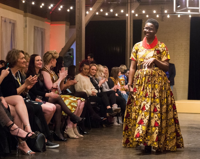 (Rick Egan  |  The Salt Lake Tribune) Lillian Thando from Uganda, walks the runway at the 8th Annual Women of the World Fashion Show. The fashion show fund is raiser for the non-profit that seeks to help refugees settle in a new culture. Wednesday, March 7, 2018.