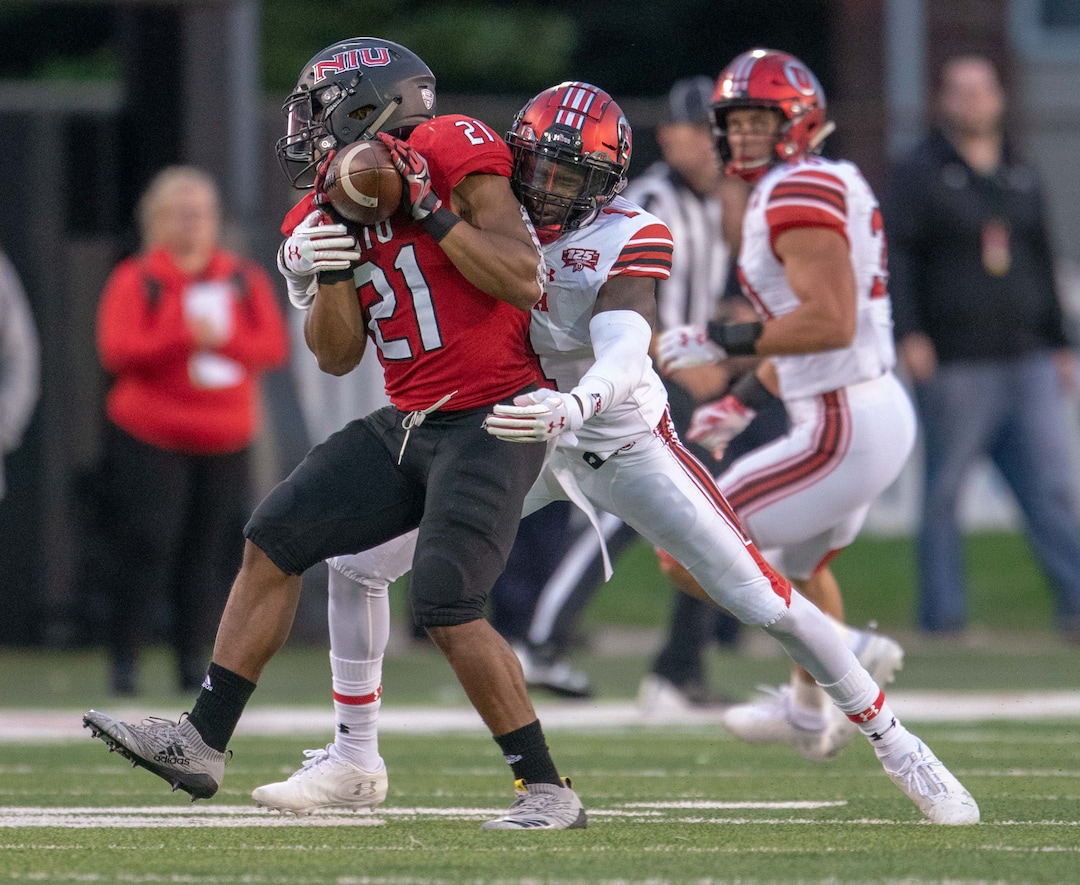 Utah Utes defensive back Jaylon Johnson (1) hits NIU running back Marcus Jones (21) after the catch for a stop during a college football game at Huskie Stadium in DeKalb, IL on Saturday, Sept. 08, 2018 (Sean King | for The Salt Lake Tribune)