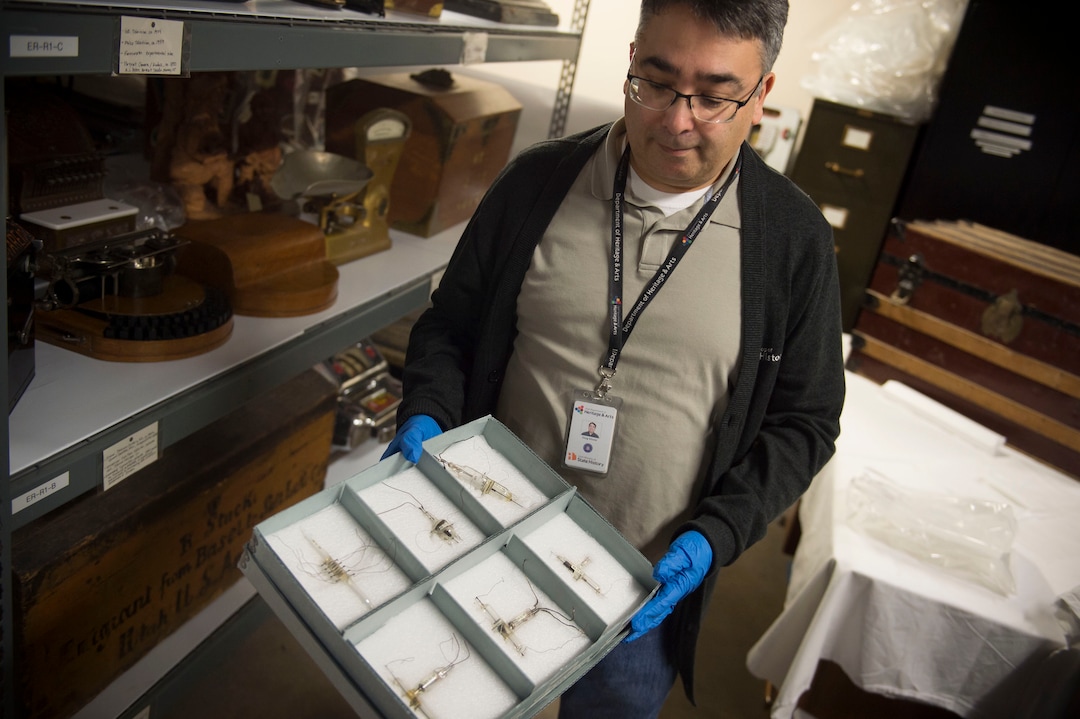 (Jeremy Harmon  |  The Salt Lake Tribune) Doug Misner shows some of Philo Farnsworth's television tubes that are stored in the basement of the Rio Grande Depot, home of the Utah state historical offices, on Feb. 15, 2018.