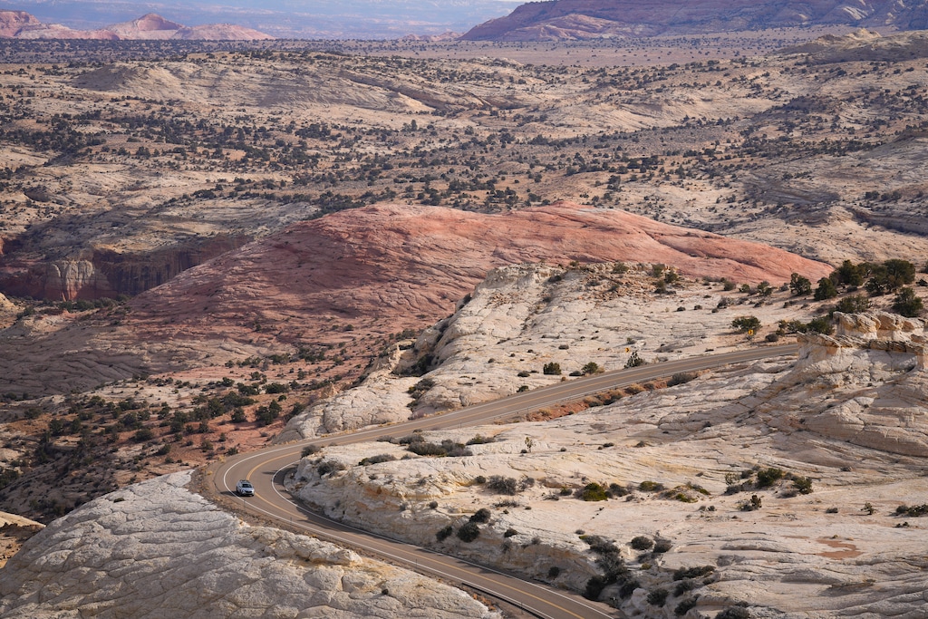 (Bethany Baker  |  The Salt Lake Tribune) A vehicle drives along Utah Scenic Byway 12 in Grand Staircase-Escalante National Monument near Escalante on Tuesday, Dec. 17, 2024.