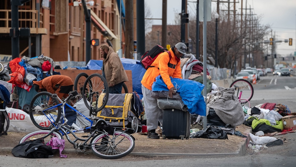 (Francisco Kjolseth | Tribune file photo) This Nov. 18, 2020, file photo shows one of the numerous homeless camps that have popped up in downtown Salt Lake City. Salt Lake City on Friday announced the opening of a temporary overflow shelter in a hotel on west North Temple.