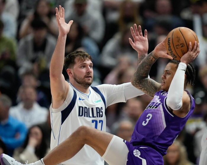(Francisco Kjolseth  |  The Salt Lake Tribune) Dallas Mavericks guard Luka Doncic (77) defends Utah Jazz guard Keyonte George (3) during an NBA basketball game Monday, March 25, 2024, in Salt Lake City.