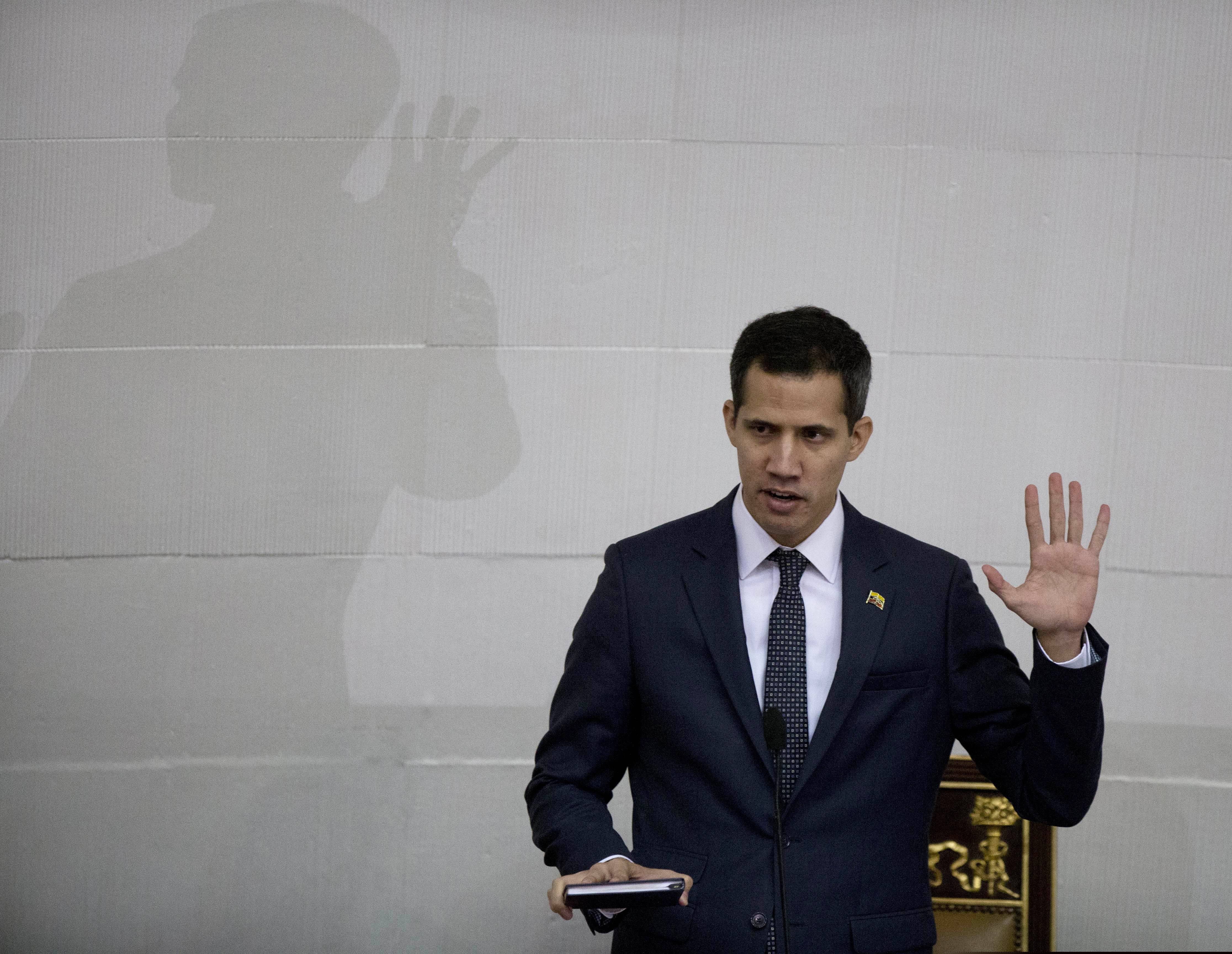 (Fernando Llano | AP file photo) Venezuelan lawmaker Juan Guaido swears in as President of the National Assembly in Caracas, Venezuela, Saturday, Jan. 5, 2019. Venezuela's opposition-controlled congress holds its first session of the year under new leadership of Juan Guaido that is promising a more frontal assault on President Nicolas Maduro as he prepares to start a second term widely condemned as illegitimate.