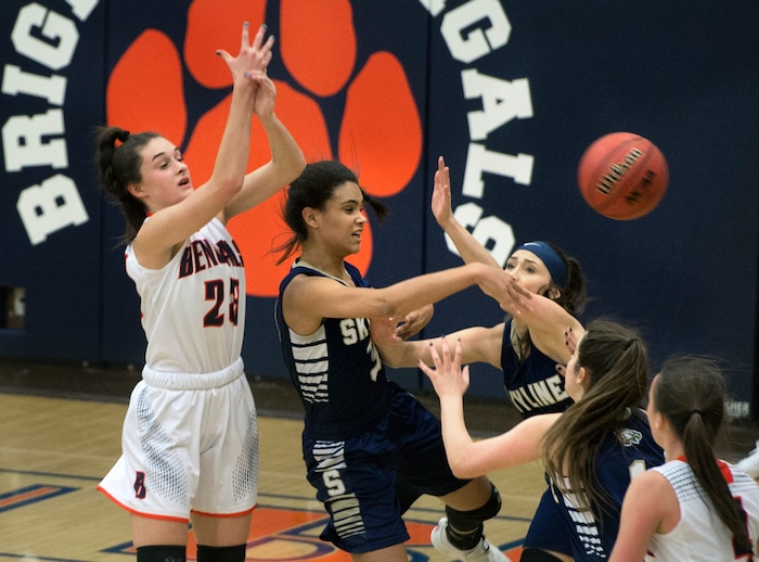(Scott Sommerdorf   |  The Salt Lake Tribune)   Brighton's Sidney Kaufman, left battles for a loose ball during first half play. Skyline defeated Brighton 66-33, Friday, January 5, 2018.