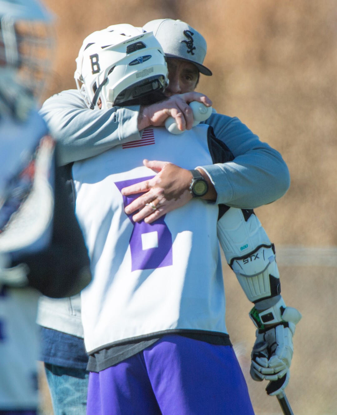 (Rick Egan | The Salt Lake Tribune) Brandyn Gaytan gets a hug from his dad, Box Elder lacrosse coach Juan Gaytan, during a tournament in Logan on Saturday, Nov. 3, 2018.