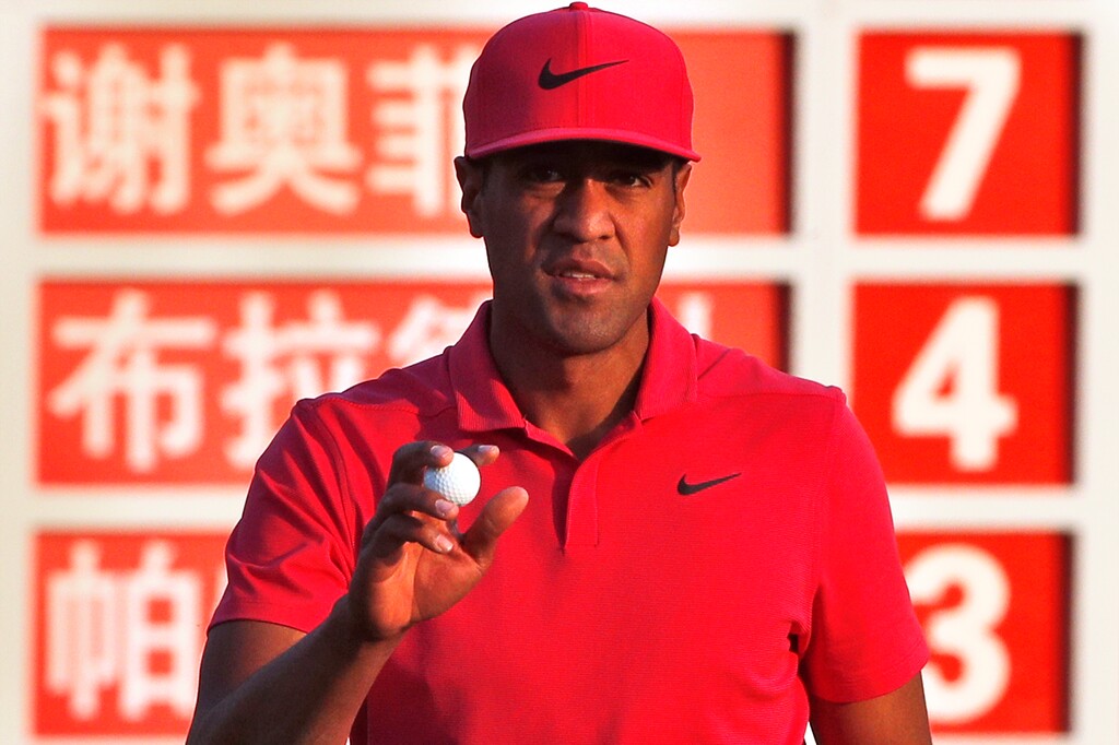 (AP Photo/Ng Han Guan) Tony Finau of Lehi reacts after finishing round three of the HSBC Champions golf tournament held at the Sheshan International Golf Club in Shanghai.