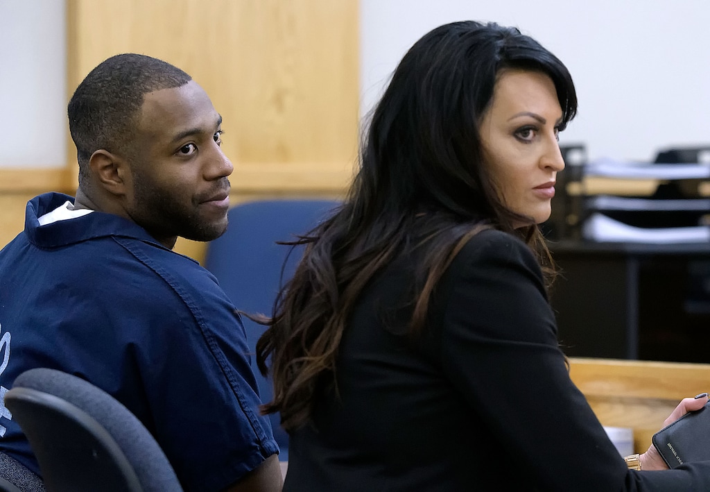 (Eli Lucero  |  Pool photo)  Torrey Green and his lawyer Skye Lazaro listen to the prosecutor speak in 1st District Court on Thursday in Logan. Green will have his seven rape cases consolidated into two trials, which will be moved to Box Elder County.