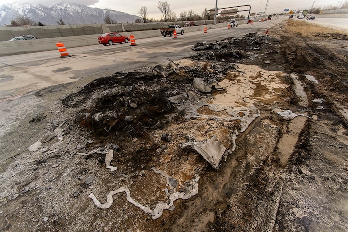 (Trent Nelson | The Salt Lake Tribune)  Charred debris at the scene of a tanker fire at 7200 South I-15, Friday January 19, 2018.