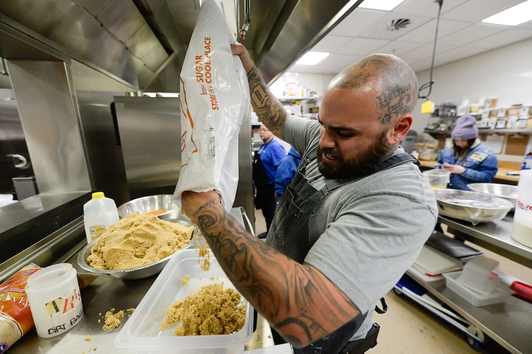 (Francisco Kjolseth  |  The Salt Lake Tribune)  A.J. Collette, head of operations and former intern at Flourish Bakery measures out brown sugar for a large pie order before the Thanksgiving holiday. The bakery needs to find a new home before Christmas. The non-profit bakery teaches those who have been incarcerated or recovering from substance abuse the art of baking. The skills they learn help them get a job and become financially independent. The bakery has been housed at SLCC's South City campus, but the college has said they can no longer use the space.
