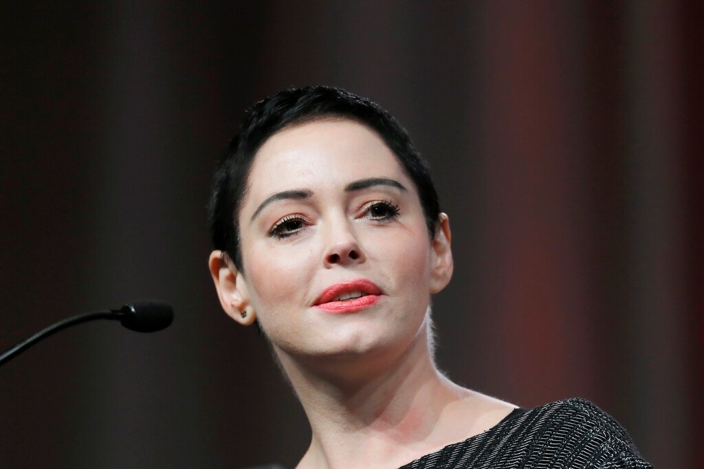 (Paul Sancya | Associated Press file photo) In this Oct. 27, 2017, file photo, actress Rose McGowan speaks at the inaugural Women's Convention in Detroit. A lawyer for Harvey Weinstein called actress McGowan's claims of rape against the former Hollywood producer are "a bold lie." McGowan details her allegations against Weinstein in her new book "Brave," released Tuesday, Jan. 30, 2018.
