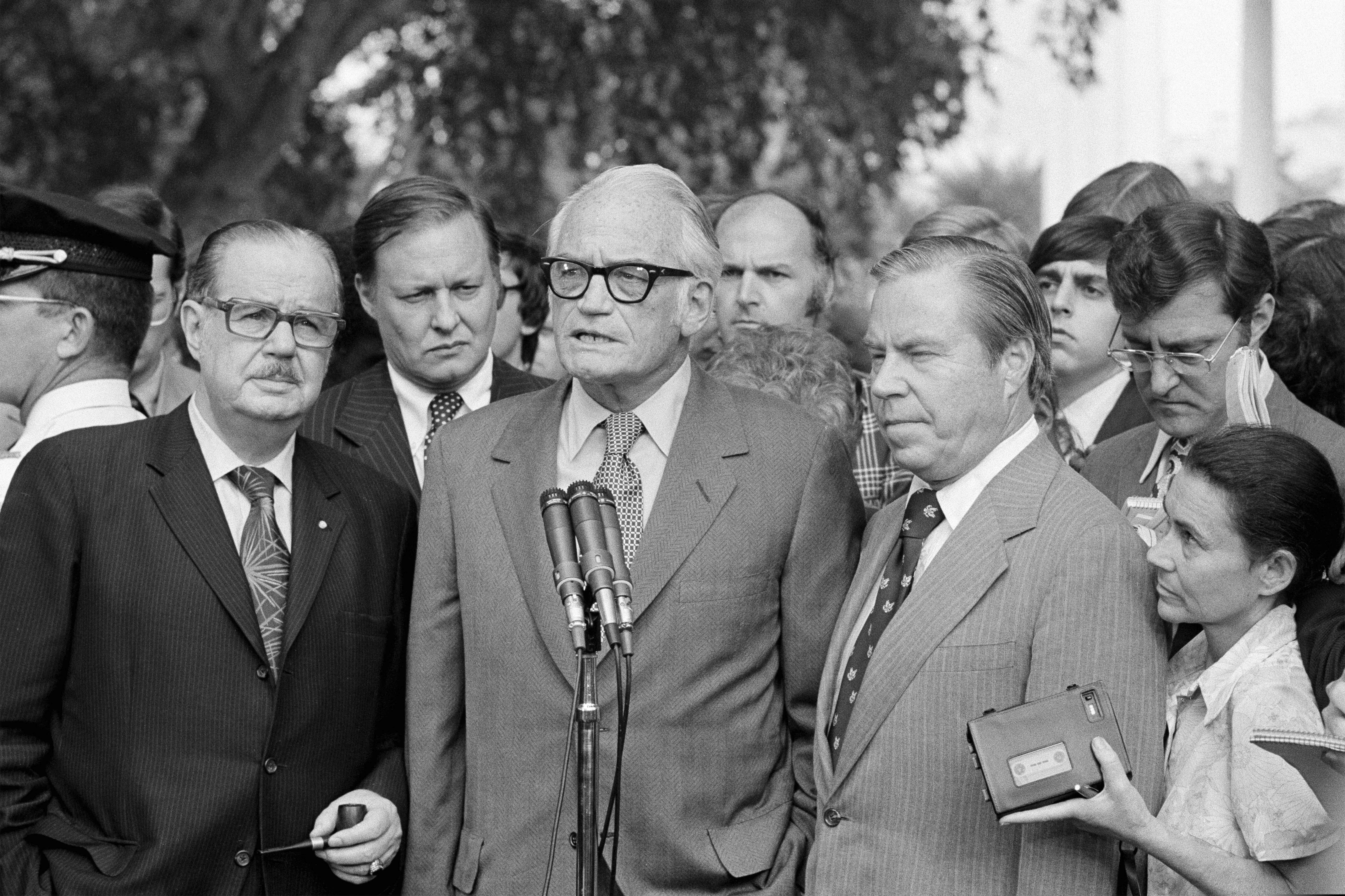 (AP photo)
In this Aug. 7, 1974, photo, Sen. Barry Goldwater, R-Ariz., center, speaks to reporters after meeting with President Richard Nixon at the White House to discuss Nixon's decision on resigning. Flanked by Senate Republican Leader Hugh Scott of Pennsylvania, left and House GOP Leader John Rhodes of Arizona, right, Goldwater said Nixon has made "no decision" on whether to resign. The three top Republican leaders in Congress paid a solemn visit to Nixon, bearing the message that he faced near-certain impeachment due to eroding support in his own party on Capitol Hill. Nixon, who’d been entangled in the Watergate scandal for two years, announced his resignation the next day.