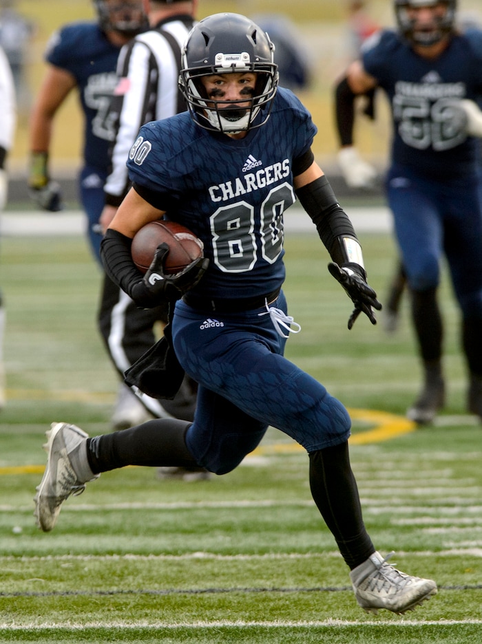 (Steve Griffin  |  The Salt Lake Tribune)  Corner Canyon receiver Noah Kjar breaks free during the Class 5A state quarterfinal football game against Highland at Corner Canyon in Draper Friday November 3, 2017.
