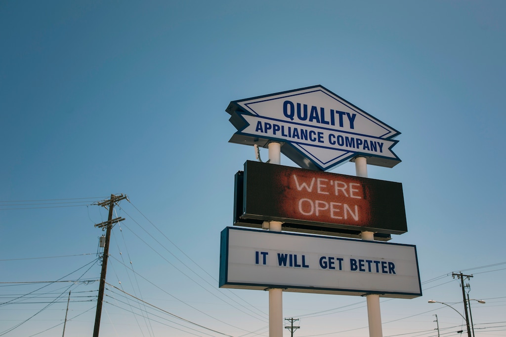 (Adria Malcolm | The New York Times) A sign outside an appliance store in Farmington, N.M., on May 5, 2020. Few people in town know anyone who was ill with the virus, but almost everyone knows someone unemployed by it.