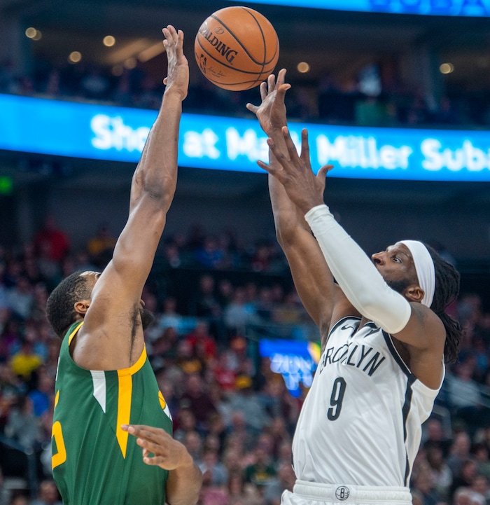 (Rick Egan  |  The Salt Lake Tribune)   Utah Jazz forward Derrick Favors (15) blocks a shot by Brooklyn Nets forward DeMarre Carroll (9) in NBA action between Utah Jazz and Brooklyn Nets at Vivint Smart Home Arena, Saturday, March 16, 2019.


