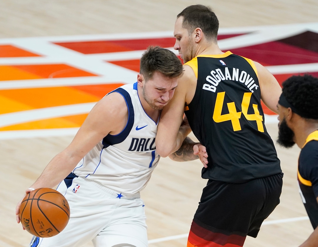 (Rick Egan | The Salt Lake Tribune)  Dallas Mavericks guard Luka Doncic (77) takes the ball to the basket, as Utah Jazz forward Bojan Bogdanovic (44) defends, in NBA action between the Utah Jazz and the Dallas Mavericks at Vivint Arena, on Friday, Jan. 29, 2021.