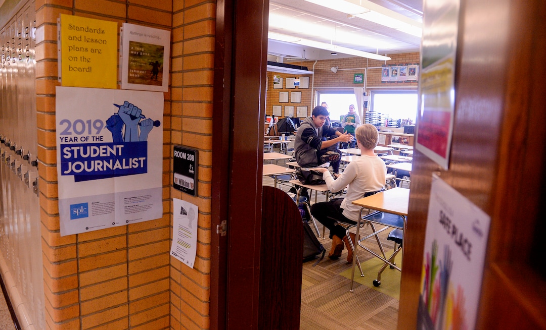 (Leah Hogsten  |  The Salt Lake Tribune) Gabriel Dela Espriella, left, and Austin Wood are junior editors for the student newspaper, The Cougar Claw, at Kearns High School.
