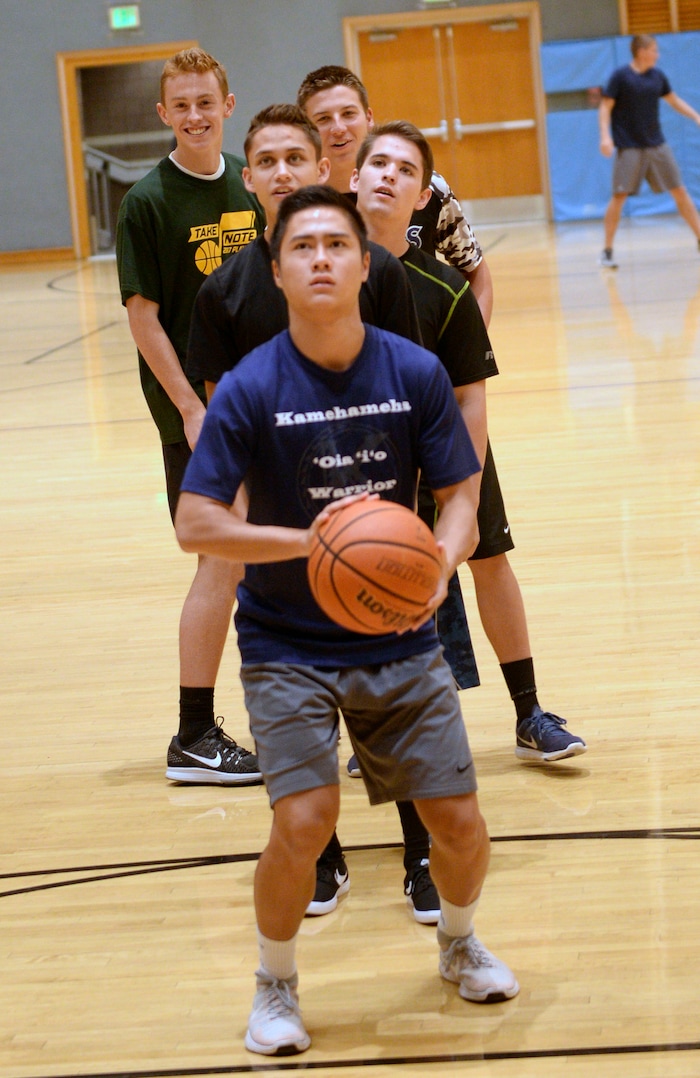 Al Hartmann  |  The Salt Lake TribuneMissionaries play a game of H-O-R-S-E in the gym to keep in shape at the Missionary Training Center in Provo Wednesday July 26.  