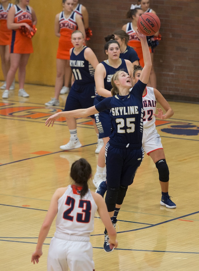 (Scott Sommerdorf   |  The Salt Lake Tribune)   Skyline's Madison Grange intercepts a pass during first half play. Skyline defeated Brighton 66-33, Friday, January 5, 2018.