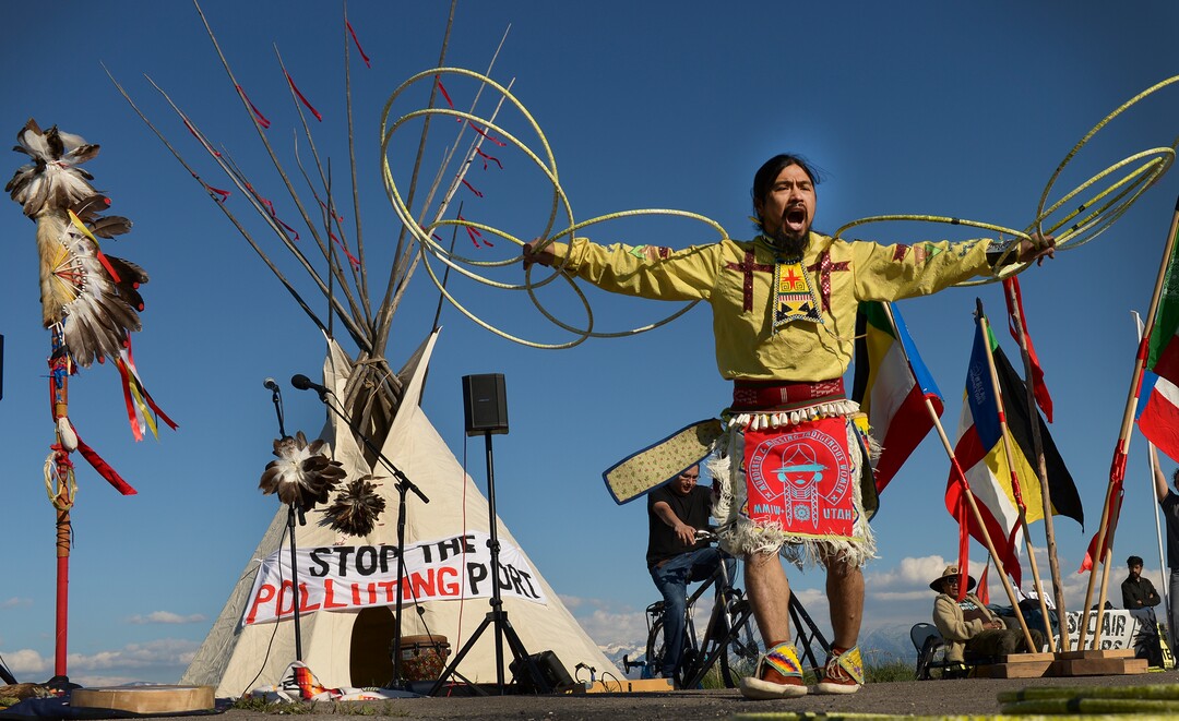 Leah Hogsten  |  The Salt Lake Tribune  Carl Moore, a Hopi and Chemehuevi Native American performs a hoop dance in honor of Mother Earth. Moore also made offerings, sang and gave a prayer during the May Day celebration. The "Stop the Polluting Port" community coalition staged a May Day celebration, calling for respect and awareness of the water, earth and air regarding the 20,000 acres west of Salt Lake City where the inland port industrial site has been proposed.