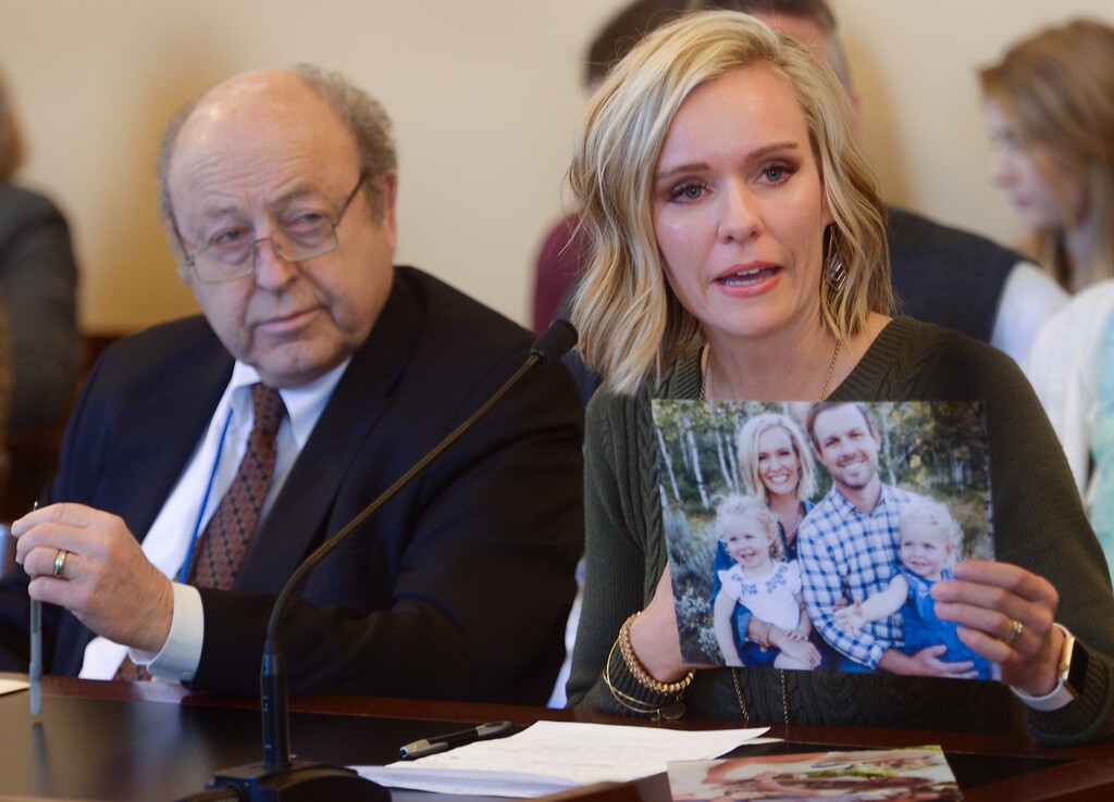 (Leah Hogsten  |  The Salt Lake Tribune) l-r Senator Lyle Hillyard, R-Logan listens as Sarah Tuttle gives reasons not to repeal SB126 regarding surrogacy Wednesday, February 7, 2018 in the Senate Health and Human Services Committee at the Capitol. "I would've given anything to have been able to carry my own children," said Tuttle who now has two daughters thanks to a surrogate, Kara Ford, who is now her best friend. 