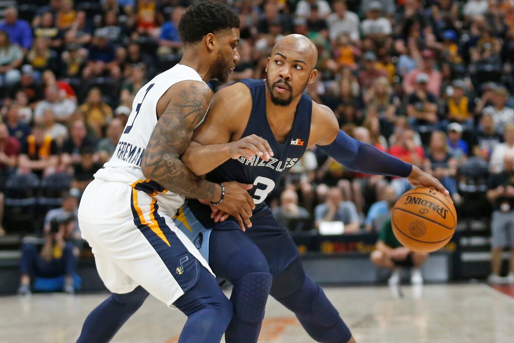 (Rick Bowmer  |  The Associated Press) Utah Jazz's Justin Wright-Foreman (3) guards Memphis Grizzlies' Jevon Carter (3) during the first half of an NBA summer league game Monday, July 1, 2019, in Salt Lake City.
