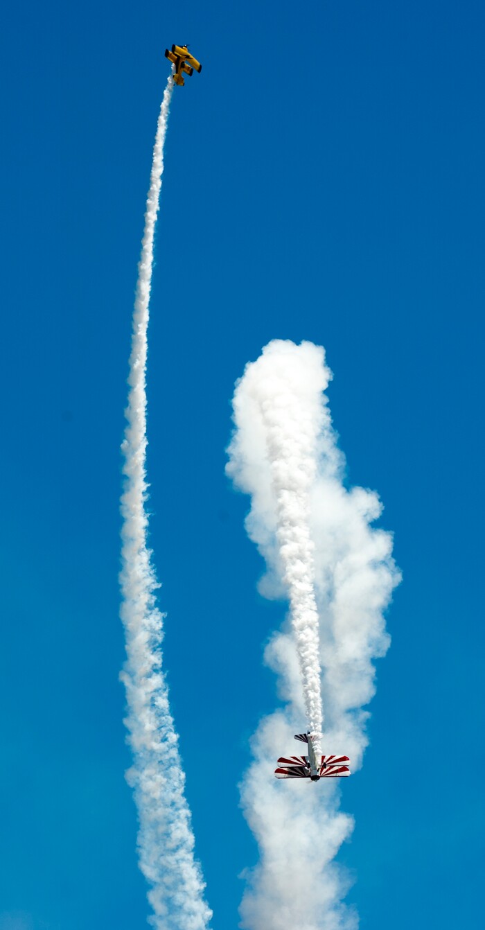 (Rick Egan  |  The Salt Lake Tribune)   Buck Roetman flies in his Pitts S-2S, along with Gary Rower in his 1941 Stearman, at the Warriors Over the Wasatch airshow at Hill Airforce Base, Sunday, June 24, 2018.