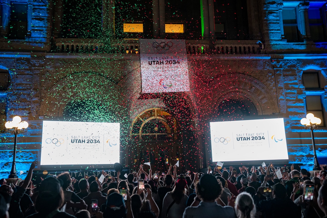 (Rick Egan | The Salt Lake Tribune) Crowds cheer as Salt Lake City is announced as hosts for the 2034 Winter Olympics at Salt Lake City Hall, Wednesday, July 24, 2024.
