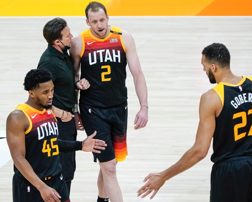 (Leah Hogsten | The Salt Lake Tribune)  Utah Jazz head coach Quin Snyder talks with Utah Jazz guard Joe Ingles (2) as they leave the court for a timeout as the Utah Jazz host the Cleveland Cavaliers, Mar. 29, 2021 at Vivint Arena. 