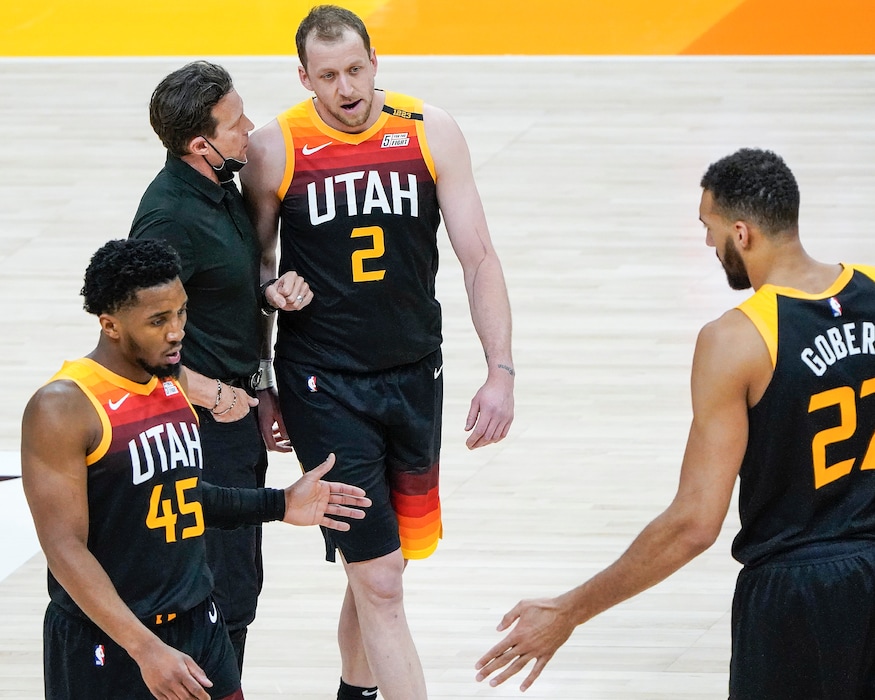 (Leah Hogsten | The Salt Lake Tribune)  Utah Jazz head coach Quin Snyder talks with Utah Jazz guard Joe Ingles (2) as they leave the court for a timeout as the Utah Jazz host the Cleveland Cavaliers, Mar. 29, 2021 at Vivint Arena. 