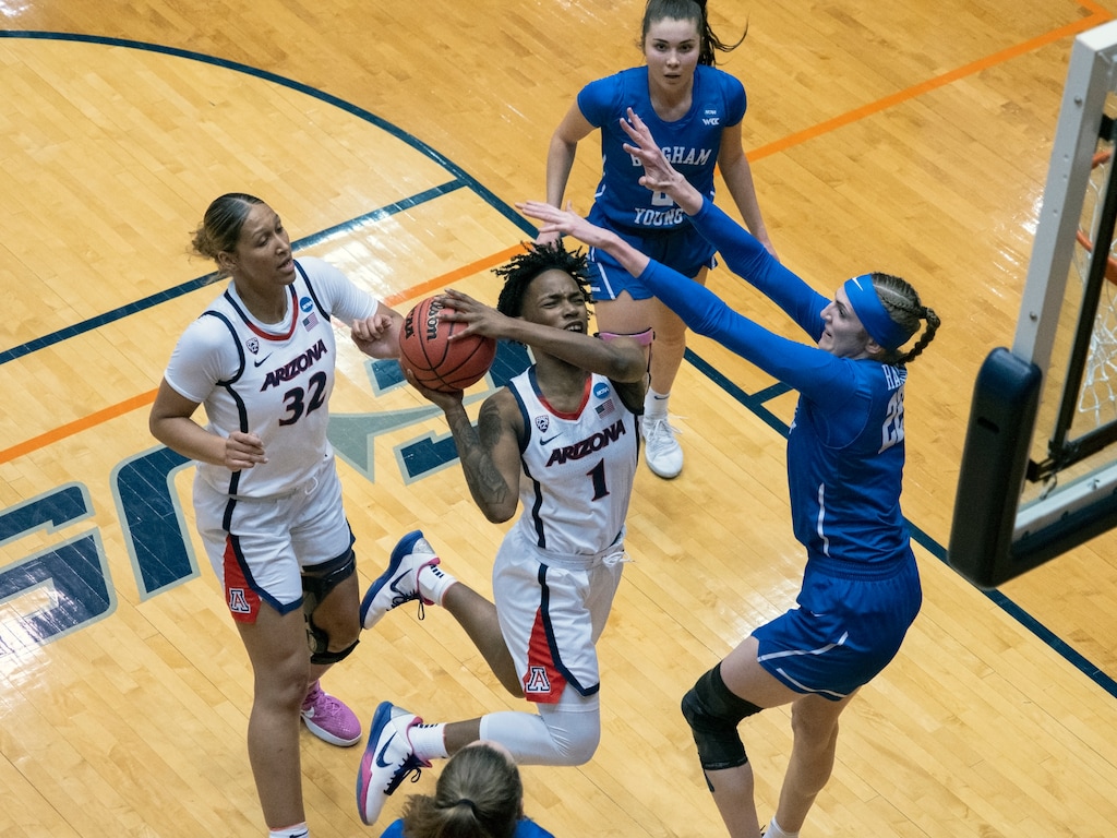 (Michael Thomas | AP) Arizona guard Shaina Pellington (1) drives the ball against BYU center Sara Hamson (22) during the first half of a college basketball game in the second round of the NCAA women's tournament at the UTSA Convocation Center in San Antonio, Wednesday, March 24, 2021.