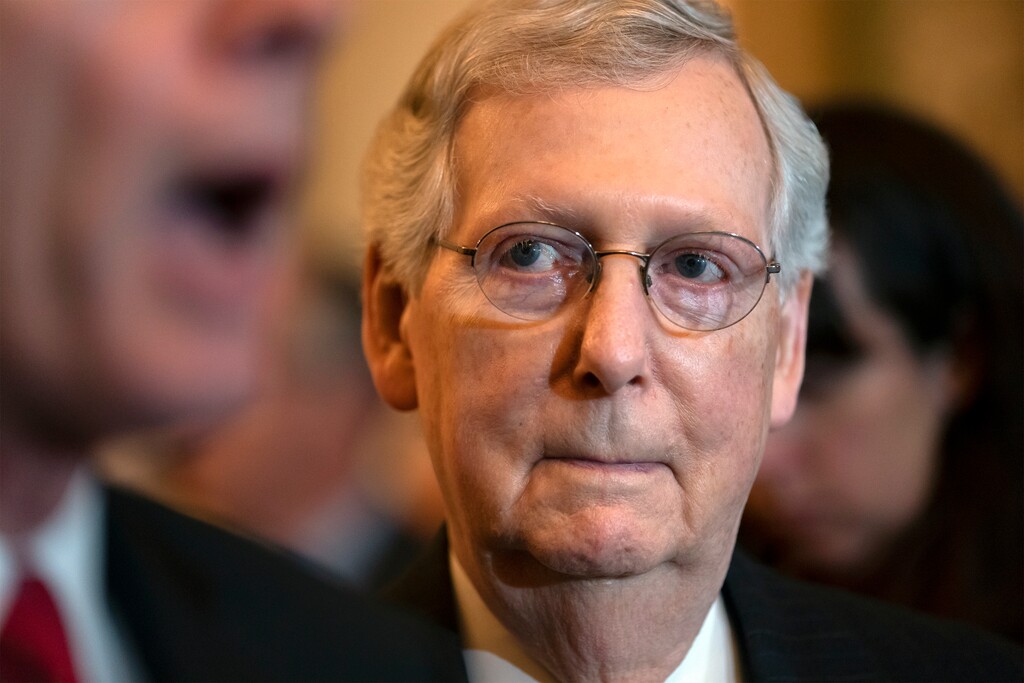 Senate Majority Leader Mitch McConnell, R-Ky., listens as Sen. John Barrasso, R-Wyo., speaks during a news conference at the Capitol in Washington, Tuesday, May 14, 2019. (AP Photo/J. Scott Applewhite)