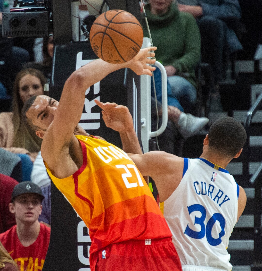 (Rick Egan  |  The Salt Lake Tribune)   Utah Jazz center Rudy Gobert (27) gets tangled up with Golden State Warriors guard Stephen Curry (30), in NBA action between Utah Jazz and Golden State Warriors, in Salt Lake City, Wednesday, Dec. 19, 2018.