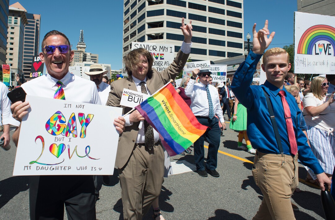 (Rick Egan  |  The Salt Lake Tribune)   Dan Jolley of West Jordan (left) walks with Mormons Building Bridges, in the Utah Pride Parade in Salt Lake City, Sunday, June 3, 2018.