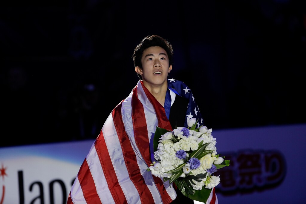 United States' Nathan Chen celebrates after winning a men's competition at the Figure Skating World Championships in Assago, near Milan, Saturday, March 24, 2018. (AP Photo/Luca Bruno)