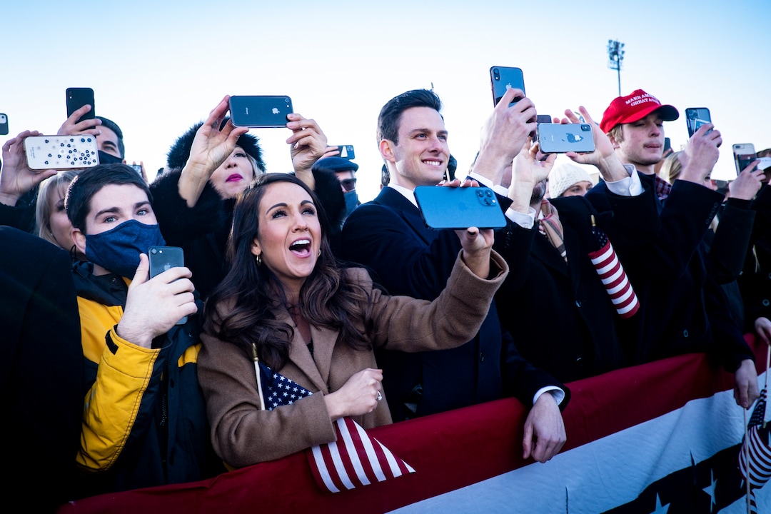 Rep. Lauren Boebert (R-Colo.) listens to President Donald Trump speak to supporters before boarding Air Force One for his last time as president at Joint Base Andrews in Maryland, Jan. 20, 2021. Defeated and twice impeached, the 45th president used his farewell remarks before a sparse crowd to brag about his record and wish luck to the incoming administration. (Pete Marovich/The New York Times)