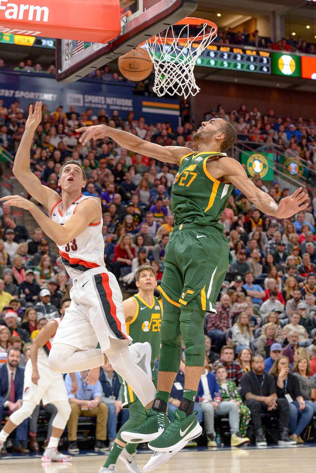 Leah Hogsten  |  The Salt Lake Tribune  Utah Jazz center Rudy Gobert (27) denies Portland Trail Blazers forward Zach Collins (33) as the Utah Jazz host the Portland Trail Blazers Christmas night at Vivint Smart Home Arena.