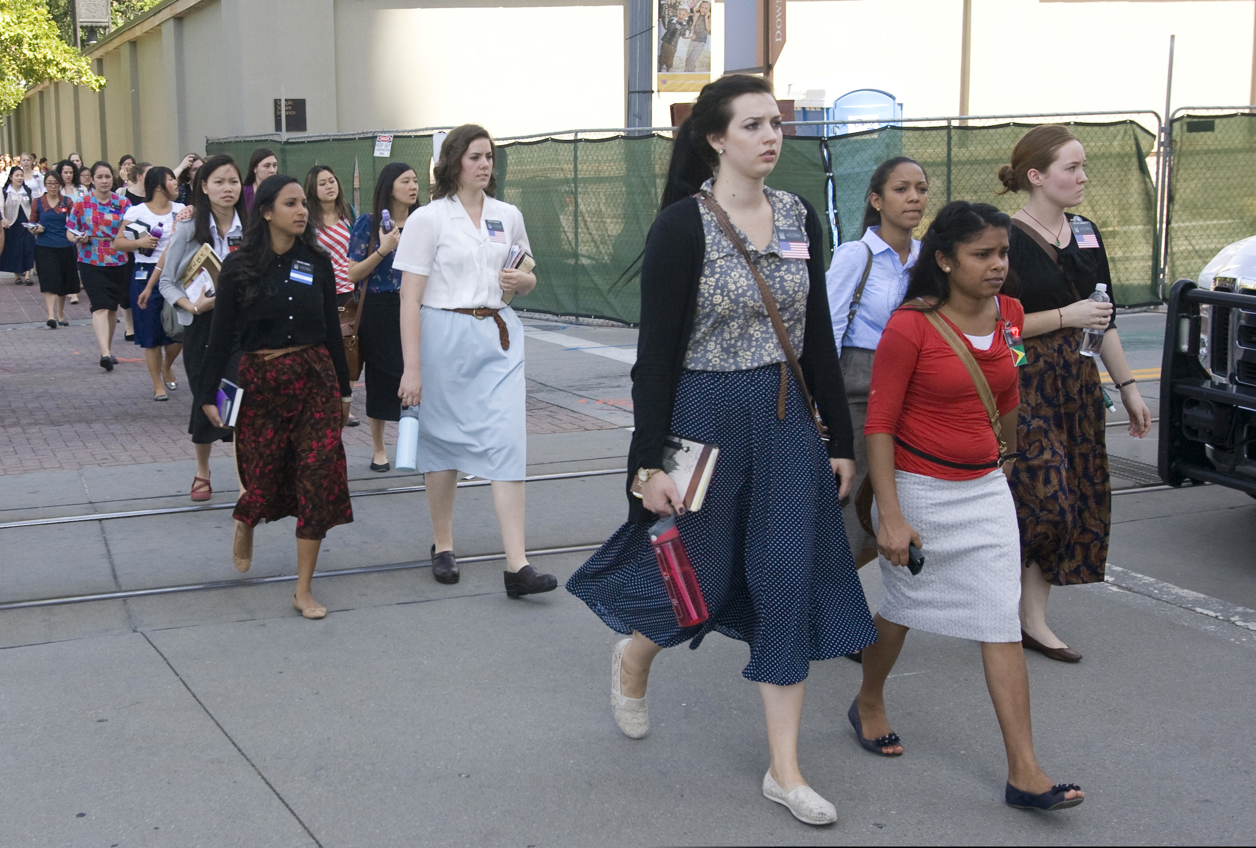 (Rick Egan | The Salt Lake Tribune) Temple Square missionaries are shown in 2013. Their mission will be dissolved in July.