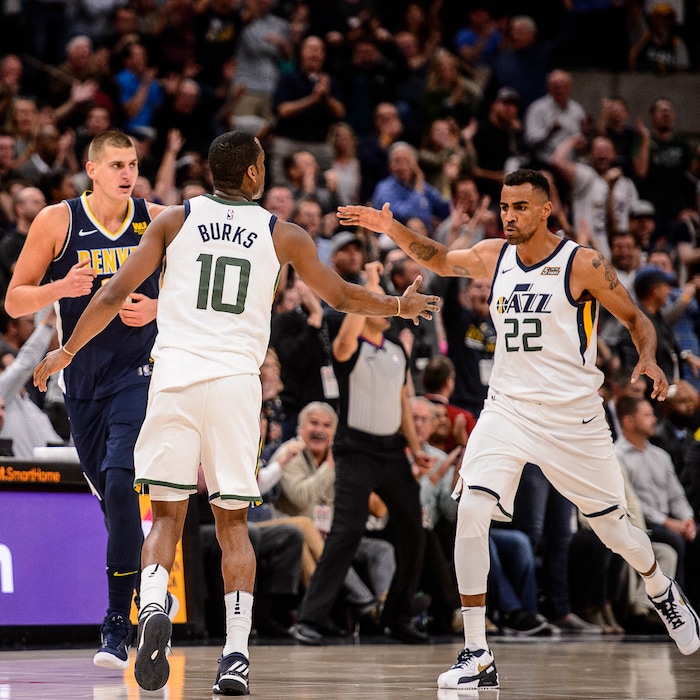 (Trent Nelson | The Salt Lake Tribune)  Utah Jazz forward Thabo Sefolosha (22) high-fives Utah Jazz guard Alec Burks (10) during a fourth quarter comeback as the Utah Jazz host the Denver Nuggets, NBA basketball in Salt Lake City, Wednesday October 18, 2017.