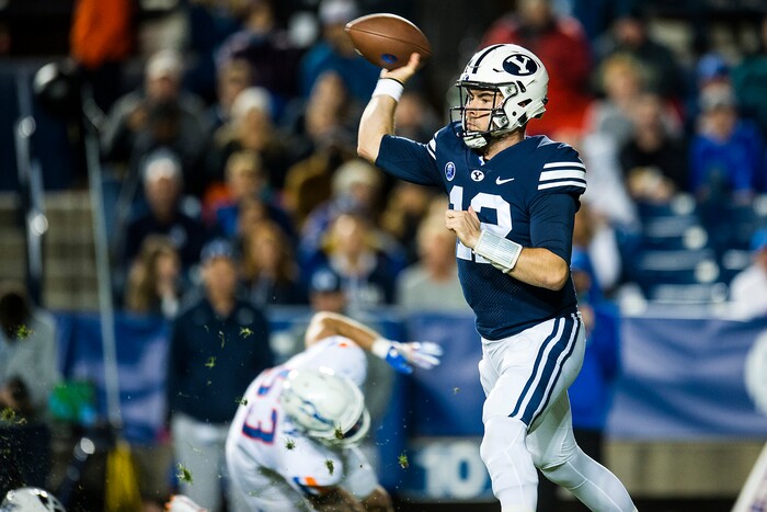 (Chris Detrick  |  The Salt Lake Tribune)  Brigham Young Cougars quarterback Tanner Mangum (12) throws the ball during the game LaVell Edwards Stadium Friday, October 6, 2017. 