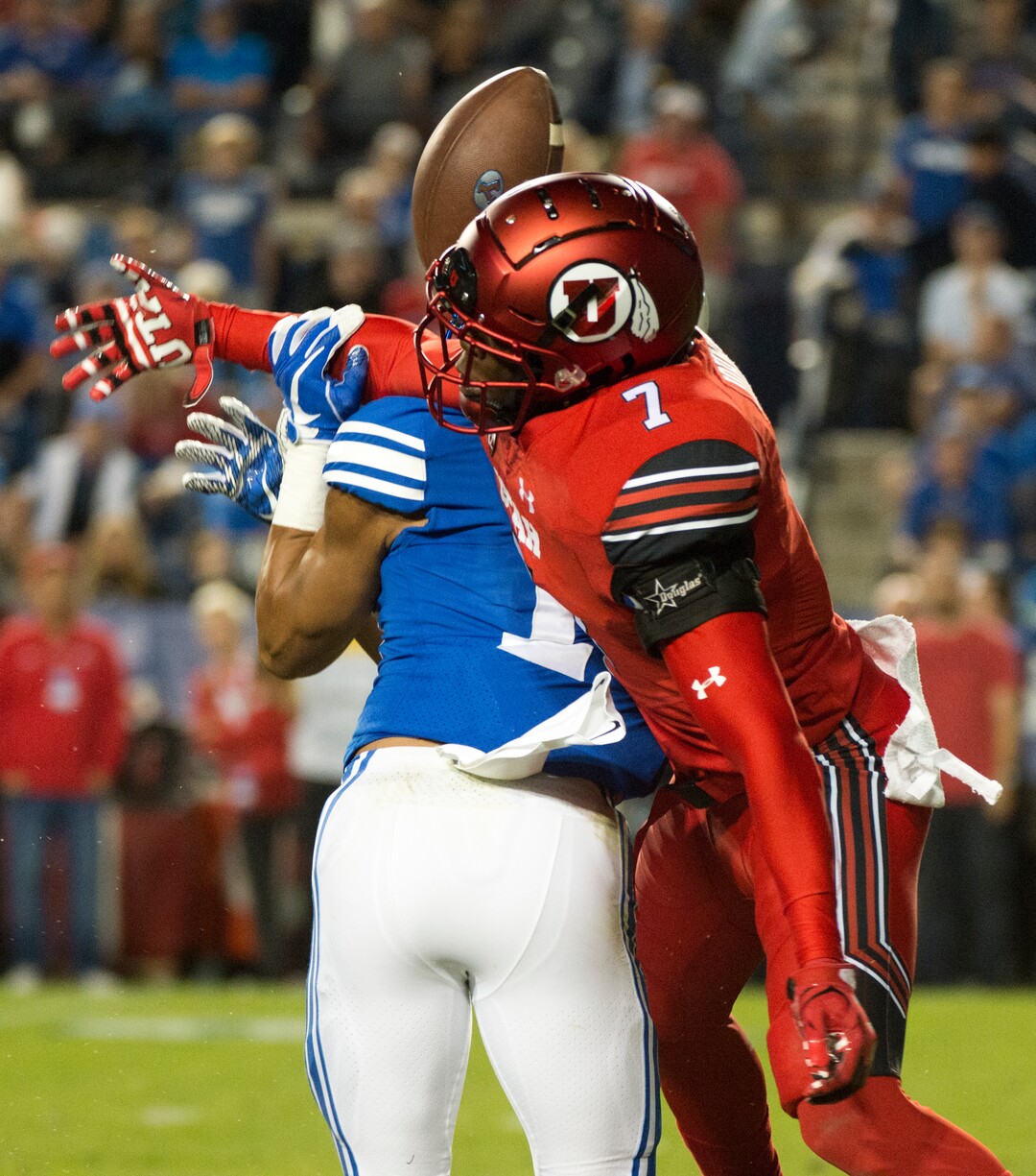 (Rick Egan  |  The Salt Lake Tribune) Utah Utes defensive back Jaylon Johnson (7) breaks up a pass intended for Brigham Young Cougars wide receiver Aleva Hifo (15), in football action BYU vs Utah, at Lavell Edwards Stadium in Provo, Saturday, September 9, 2017.