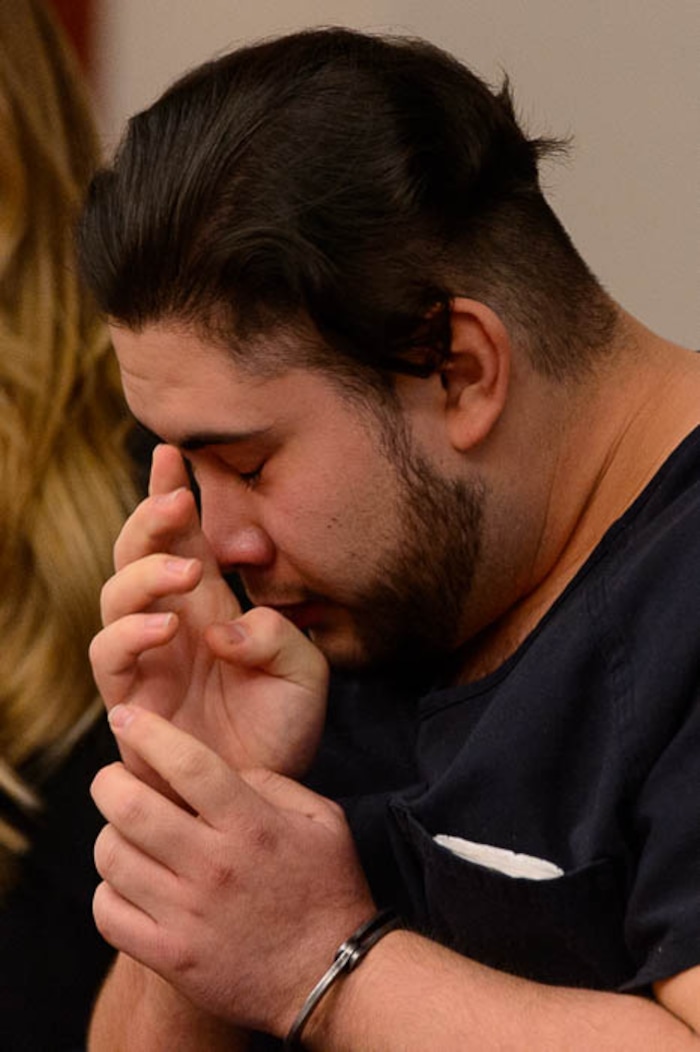 (Trent Nelson | The Salt Lake Tribune)  Abraham Miranda listens to statements from victims and their families at his sentencing in Salt Lake City, Thursday December 21, 2017. Miranda, 19, pleaded guilty to manslaughter counts for a February crash that killed two of his West High School classmates and critically injured a pregnant woman and her baby.
